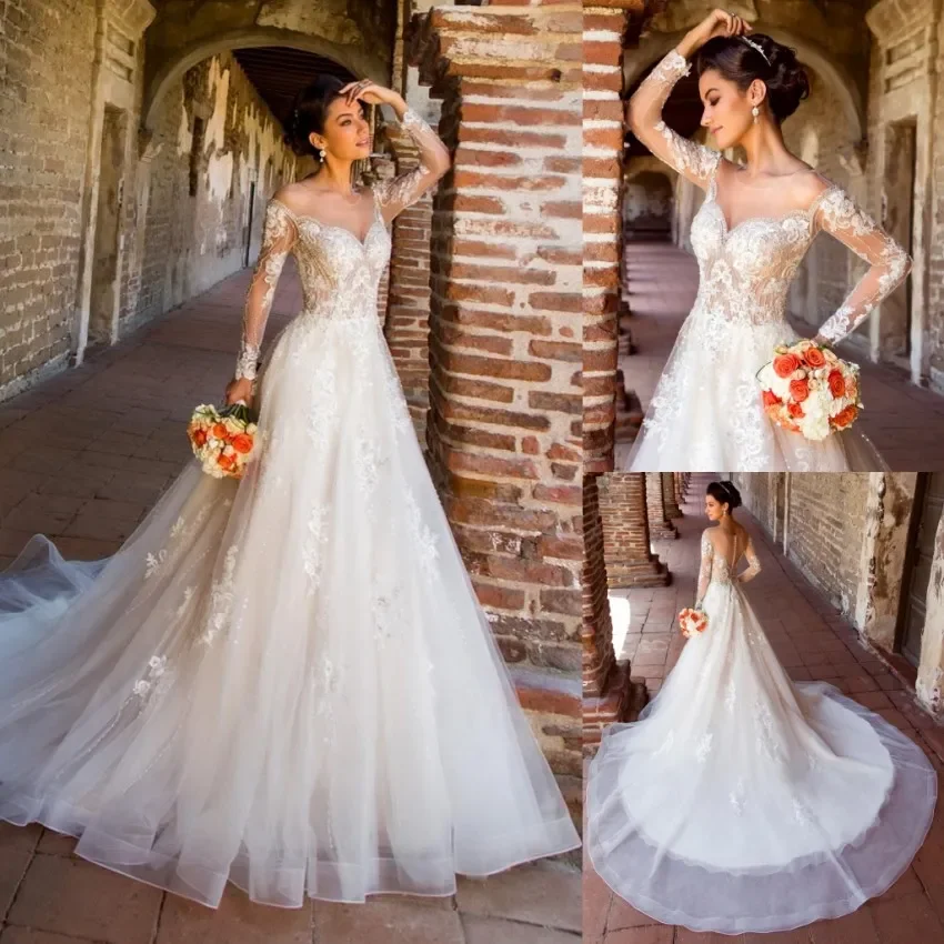 Luxury Glitter A-line lace applique Wedding dress Sexy V-neck Transparent jewelry neck Beaded long sleeve bridal dress custom
Luxury Glitter A-line lace applique Wedding dress Sexy V-neck Transparent jewelry neck Beaded long sleeve bridal dress custom
