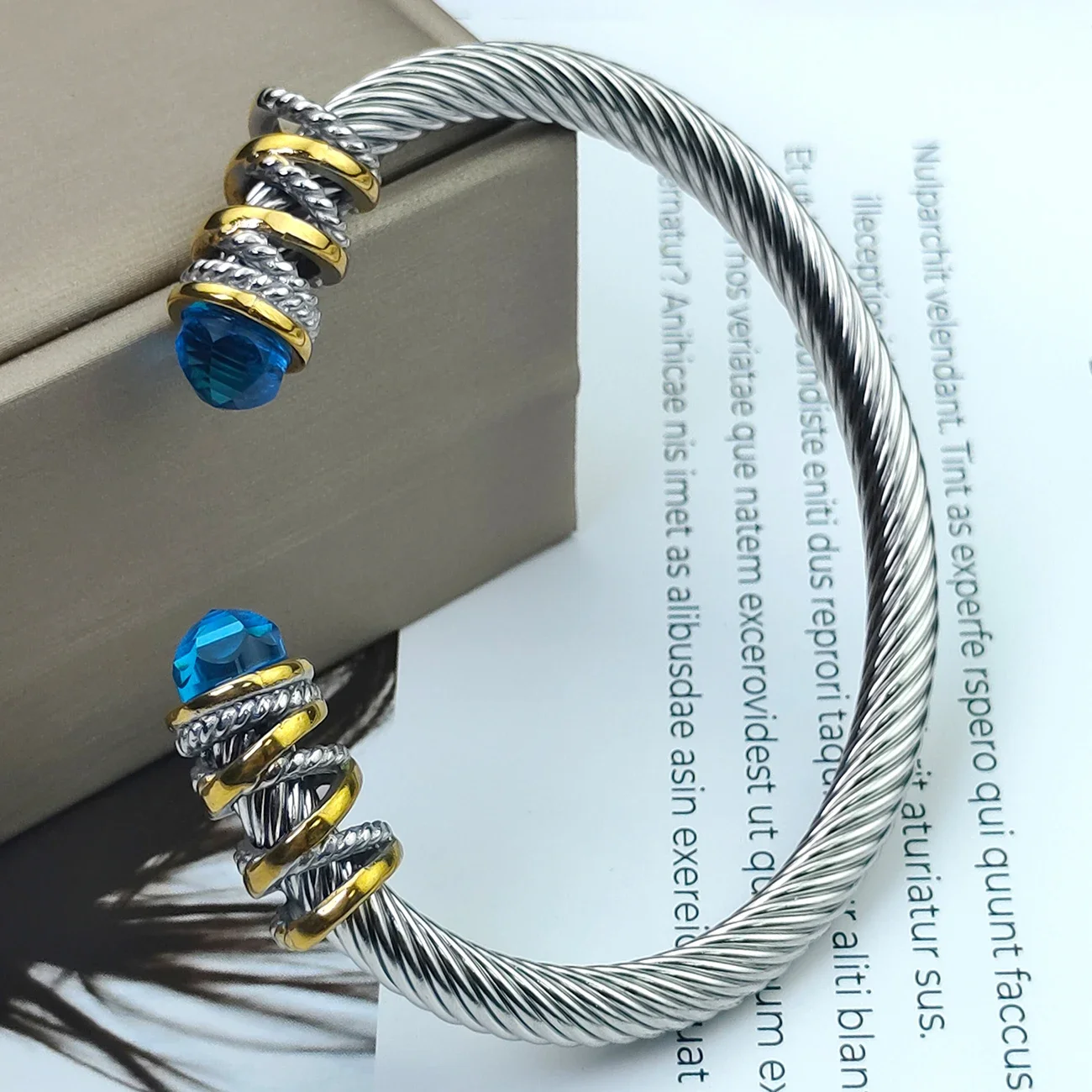 Elegant Goldtone with Zirconia Stainless Steel Cable Open Bracelet Designed for Women
Elegant Goldtone with Zirconia Stainless Steel Cable Open Bracelet Designed for Women
