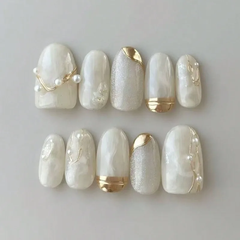 10Pcs Handmade Nails Pearl Gold Foil Cat-Eye French Short Style These Press-on Nails Make A Great Gift for Girls and Friends
10Pcs Handmade Nails Pearl Gold Foil Cat-Eye French Short Style These Press-on Nails Make A Great Gift for Girls and Friends