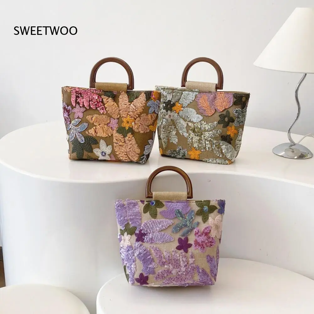 Women Purple Floral Sequin Tote Bag with Wooden Handle and Linen Base Handmade Embroidered Mini Top Handle Bag for Vacation
Women Purple Floral Sequin Tote Bag with Wooden Handle and Linen Base Handmade Embroidered Mini Top Handle Bag for Vacation