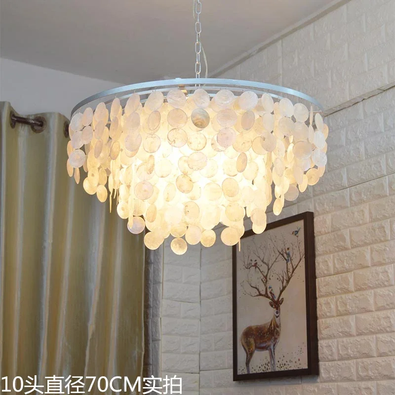 Modern minimalist European living room American Nordic ceiling lamp shell bedroom lamp dining table study lamp
Modern minimalist European living room American Nordic ceiling lamp shell bedroom lamp dining table study lamp