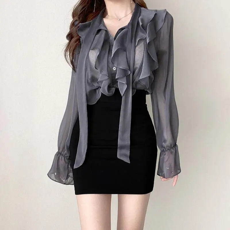 Elegant V-Neck Ruffles Flare Sleeve Button Blouse Casual Solid Color Tops Loose Commute Spring Autumn Female Clothing Shirt
Elegant V-Neck Ruffles Flare Sleeve Button Blouse Casual Solid Color Tops Loose Commute Spring Autumn Female Clothing Shirt