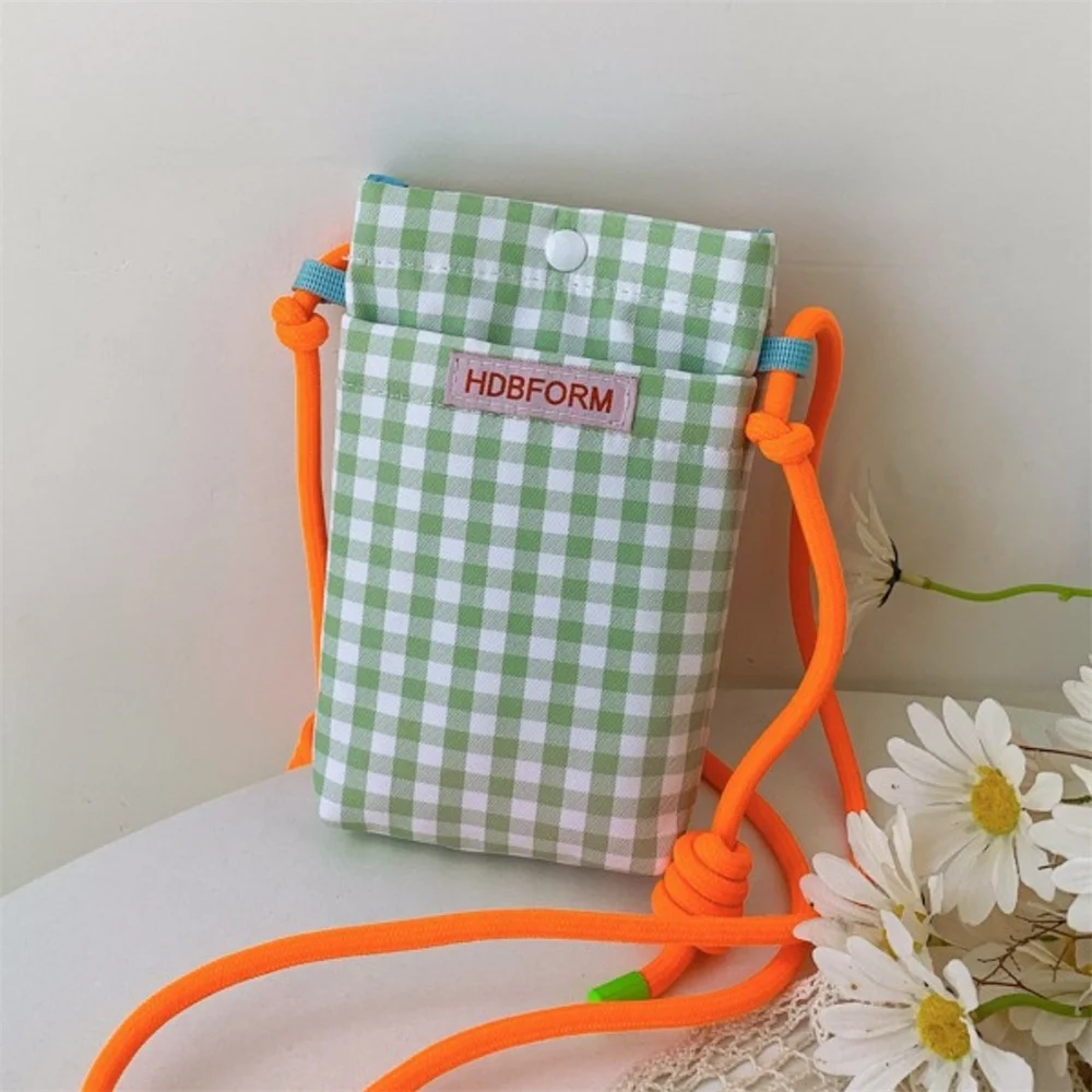 Portable Crossbody Mobile Phone Bags Fashion Mini Square Grid Canvas Shoulder Bag Women Girls Lipstick Storage Bags
Portable Crossbody Mobile Phone Bags Fashion Mini Square Grid Canvas Shoulder Bag Women Girls Lipstick Storage Bags
