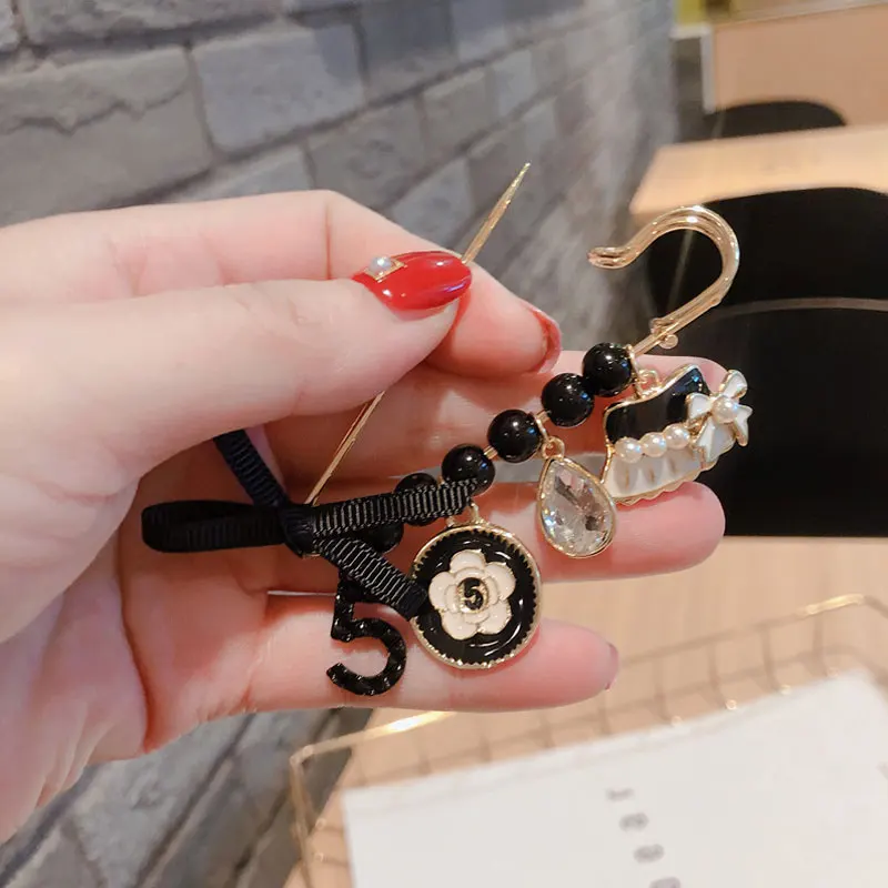 Trend Pearl Bow Brooches Small Fragrance Number 5 All-match Brooch Pin Tassel Fresh Ladies Jewelry Clothing Accessories
Trend Pearl Bow Brooches Small Fragrance Number 5 All-match Brooch Pin Tassel Fresh Ladies Jewelry Clothing Accessories