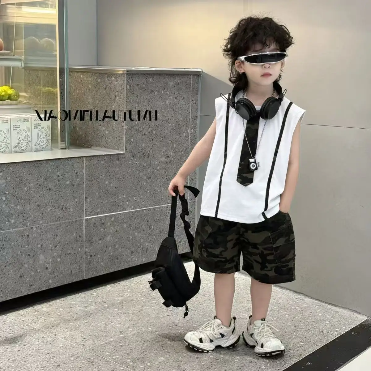 Boys 2026 Summer Set New Camouflage Splicing White Tank Top Handsome Sleeveless Top+Camouflage Shorts Set Fashionable Outfits
Boys 2026 Summer Set New Camouflage Splicing White Tank Top Handsome Sleeveless Top+Camouflage Shorts Set Fashionable Outfits