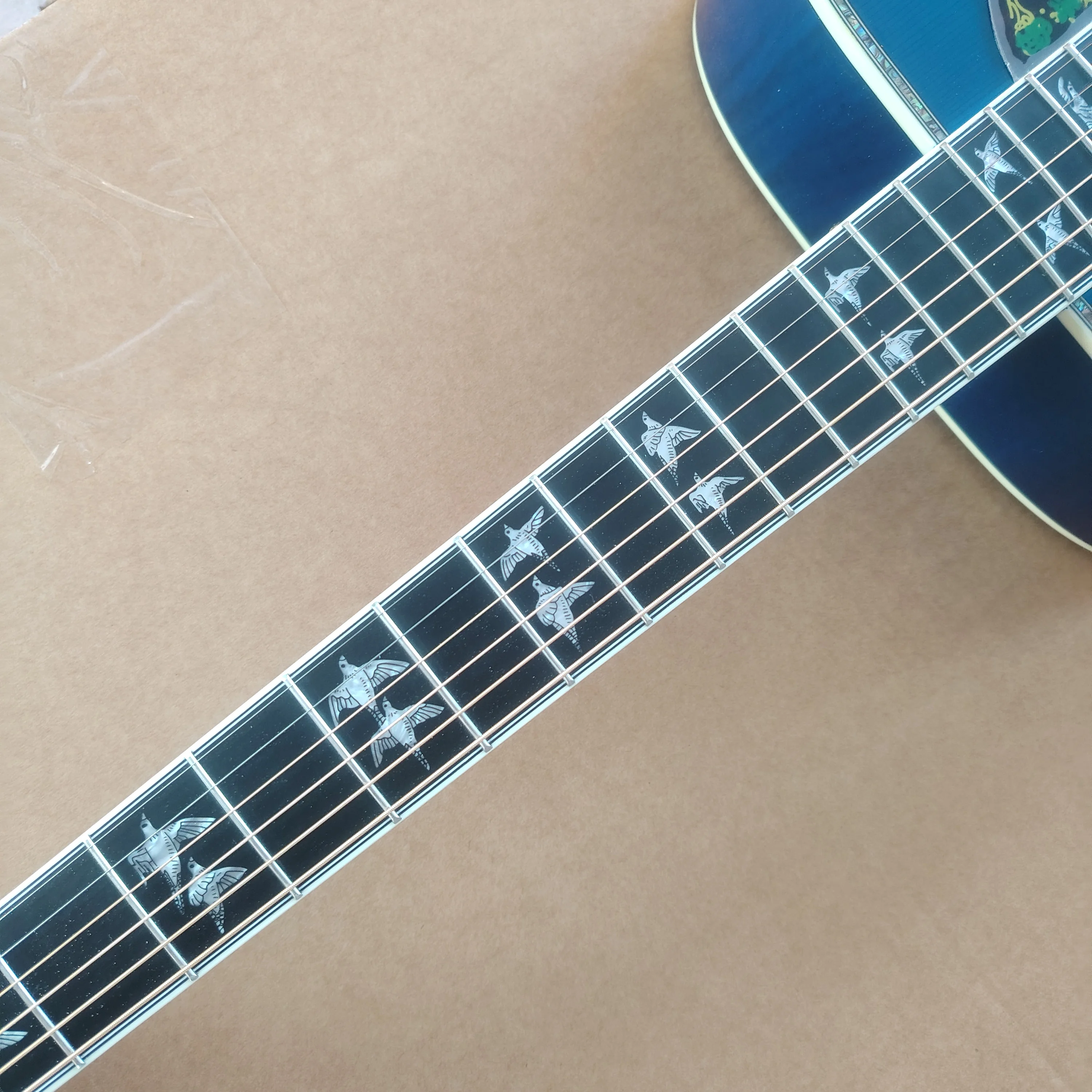41 inch, 6-string acoustic guitar, redwood fingerboard, spruce top,
41 inch, 6-string acoustic guitar, redwood fingerboard, spruce top,