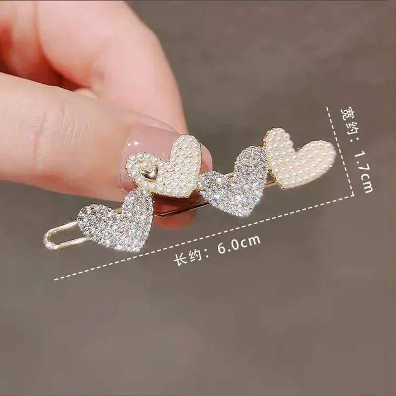 Sweet Heart Pearl Girls Bangs Clip Korean Shiny Rhinestone Hairpin Bangs Side Clip Buckle Hairpin Women Hair Styling Headwear
Sweet Heart Pearl Girls Bangs Clip Korean Shiny Rhinestone Hairpin Bangs Side Clip Buckle Hairpin Women Hair Styling Headwear