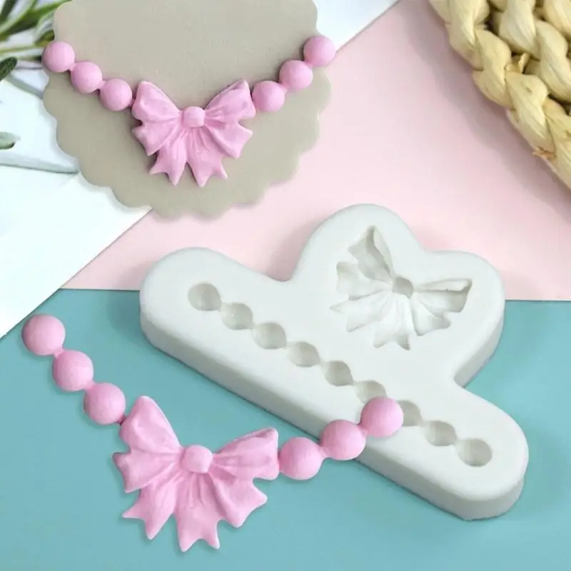 Bowknot Pearl Necklace Shaped Candy Molds Silicone Mould Cake Decorating Tools L5BE 
Bowknot Pearl Necklace Shaped Candy Molds Silicone Mould Cake Decorating Tools L5BE