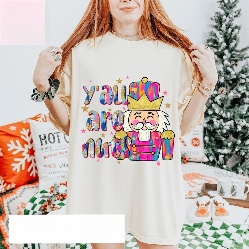 Y’all Are Nuts Claus Glitter Nutcracker Shirt Funny Trendy Merry Christmas Santa Lovely Letters Print Hot Sale Women's T Shirt
Y’all Are Nuts Claus Glitter Nutcracker Shirt Funny Trendy Merry Christmas Santa Lovely Letters Print Hot Sale Women's T Shirt
