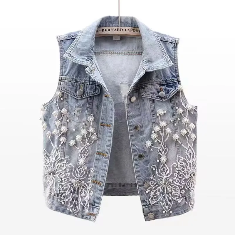 Women Denim Vest Luxury Pearl Fashion Ripped Autumn Jeans Jacket Sleeveless Loose Short Coat Streetwear Beaded Flower Denim Vest
Women Denim Vest Luxury Pearl Fashion Ripped Autumn Jeans Jacket Sleeveless Loose Short Coat Streetwear Beaded Flower Denim Vest