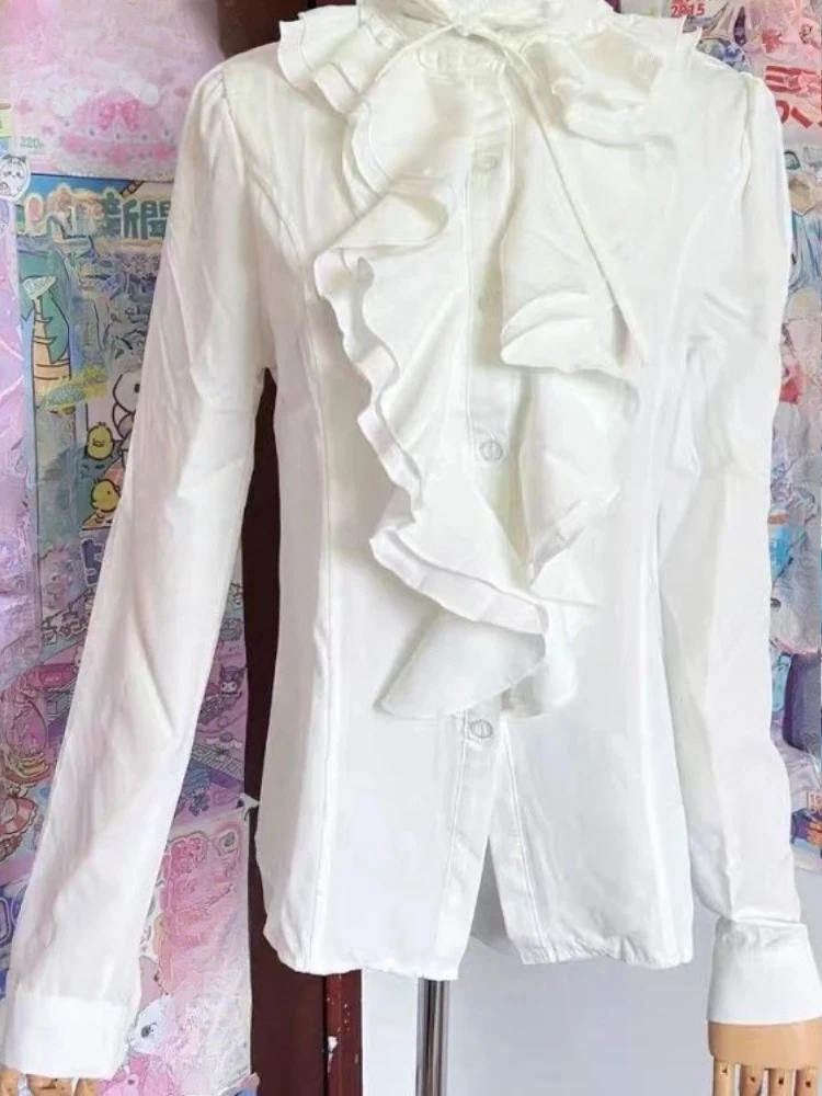 2026 Модная женская блузка в стиле Лолита с рюшами, готическая винтажная рубашка с воротником-стойкой и завязками
2026 Модная женская блузка в стиле Лолита с рюшами, готическая винтажная рубашка с воротником-стойкой и завязками