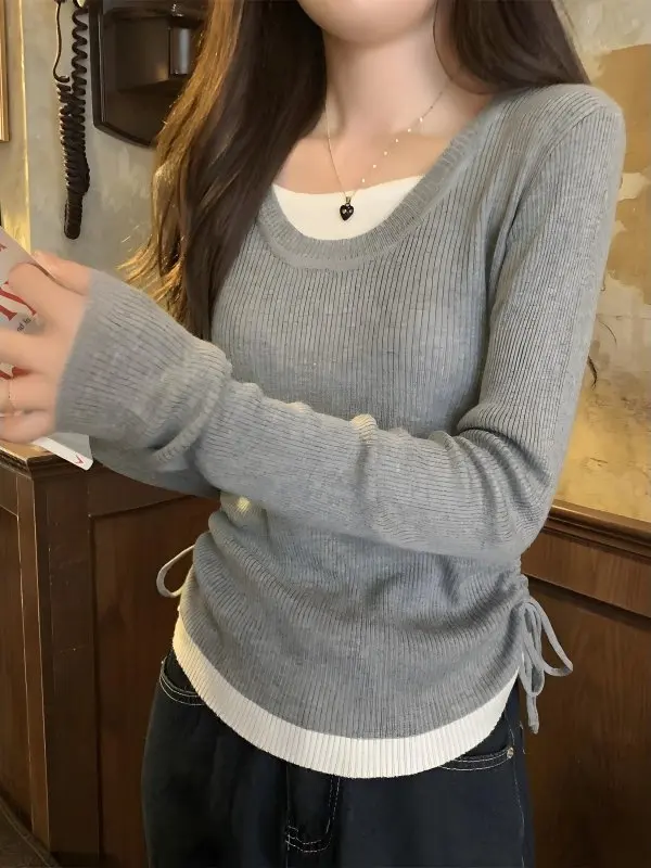 Women's Knitted Sweater with Drawstring Waist Design Casual Style Gray Base Shirt Spring Early Season Fashion Trend
Women's Knitted Sweater with Drawstring Waist Design Casual Style Gray Base Shirt Spring Early Season Fashion Trend