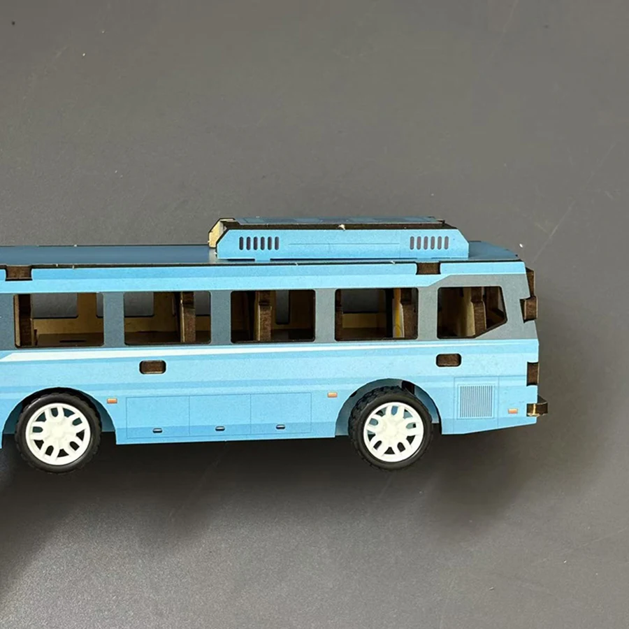 Wooden building block bus, City series blue bus. Simple toy assembly. The desktop decoration is themed around the city.
Wooden building block bus, City series blue bus. Simple toy assembly. The desktop decoration is themed around the city.