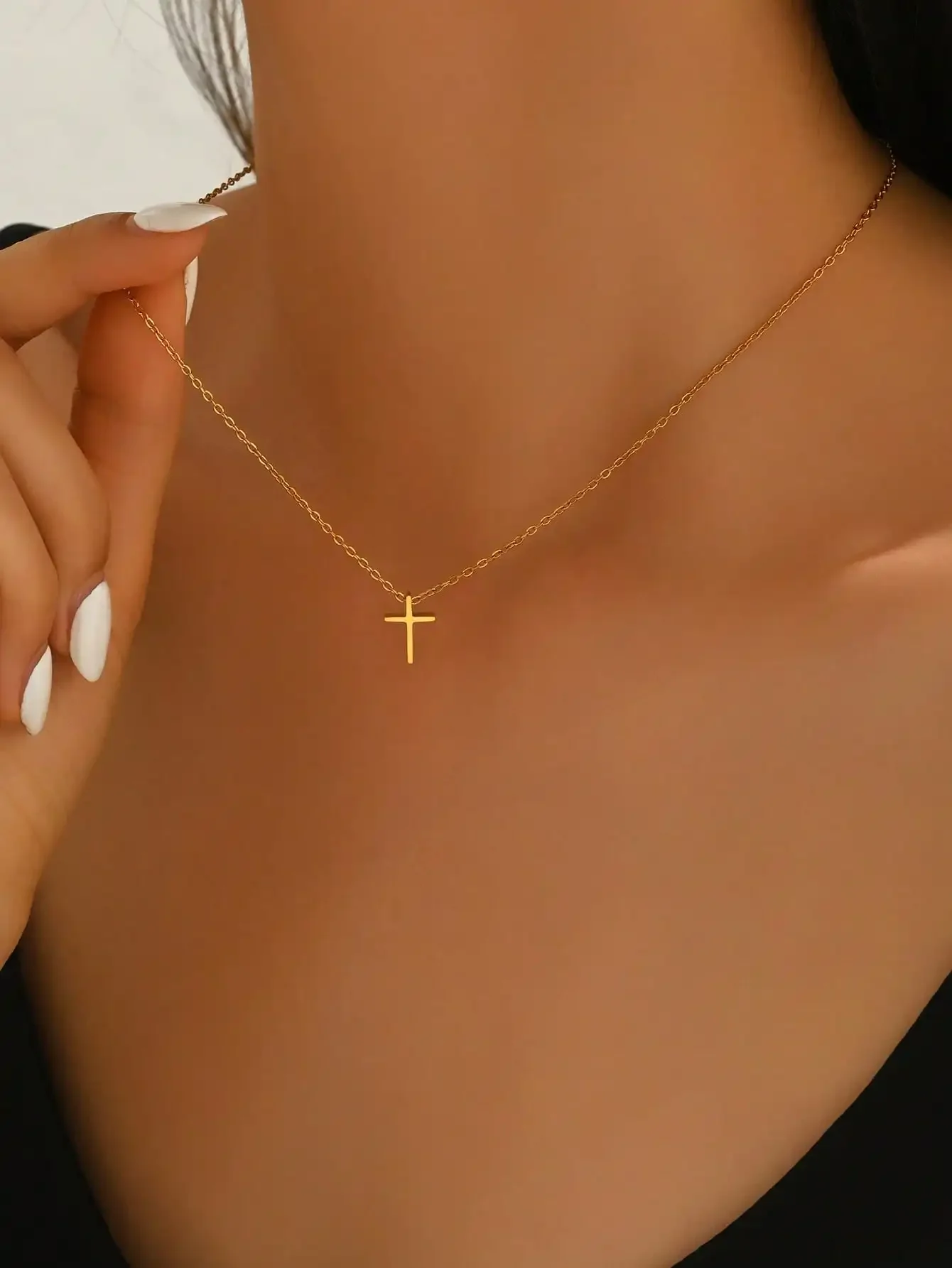 Delicate Gold-Tone Mini Cross Pendant Necklace on Fine Chain
Delicate Gold-Tone Mini Cross Pendant Necklace on Fine Chain