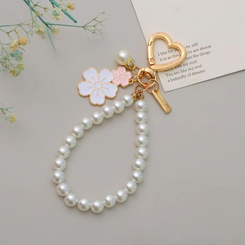 1pc Lovely Cherry Blossoms Fan Keychain Pearl Chain Pendant Women Car Key Ring Headphone Case Charms Bag Decor Accessories
1pc Lovely Cherry Blossoms Fan Keychain Pearl Chain Pendant Women Car Key Ring Headphone Case Charms Bag Decor Accessories