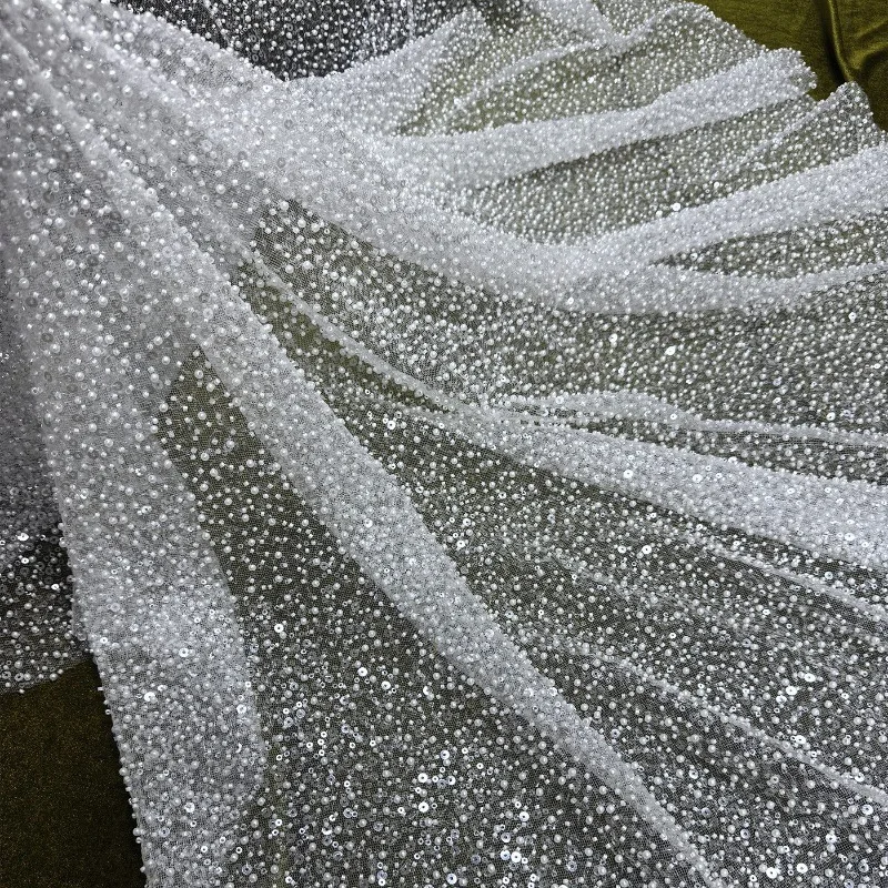 Ткань шириной 1,3 м, новая, изысканная, классическая, роскошная, с кружевной вышивкой и жемчугом, высококачественные аксессуары для свадебных платьев
Ткань шириной 1,3 м, новая, изысканная, классическая, роскошная, с кружевной вышивкой и жемчугом, высококачественные аксессуары для свадебных платьев