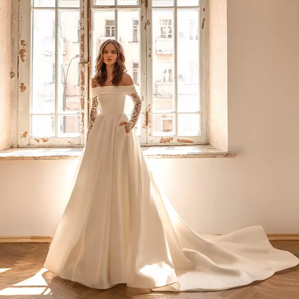 Boat Collar Satin Elegant Wedding Party Dress with Floral Lace Long Sleeve A-line Court Pockets Wedding Gown Customzied
Boat Collar Satin Elegant Wedding Party Dress with Floral Lace Long Sleeve A-line Court Pockets Wedding Gown Customzied
