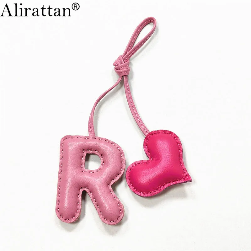 Alirattan New Trendy English Letter R With Heart Charm Accessories Fashion Designer Genuine Leather Alphabet Keychain Pendant
Alirattan New Trendy English Letter R With Heart Charm Accessories Fashion Designer Genuine Leather Alphabet Keychain Pendant