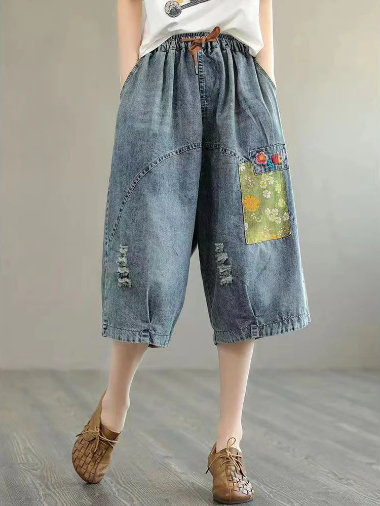Ethnic style embroidered ripped shorts jeans women's summer new loose casual design sense wide leg five quarter pants
Ethnic style embroidered ripped shorts jeans women's summer new loose casual design sense wide leg five quarter pants