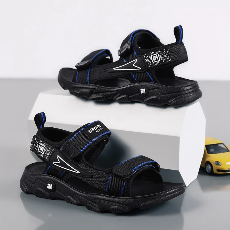 A pair of kids hook and loop sport sandals thick anti-slip sole woven straps summer beach casual shoes JY-810
A pair of kids hook and loop sport sandals thick anti-slip sole woven straps summer beach casual shoes JY-810