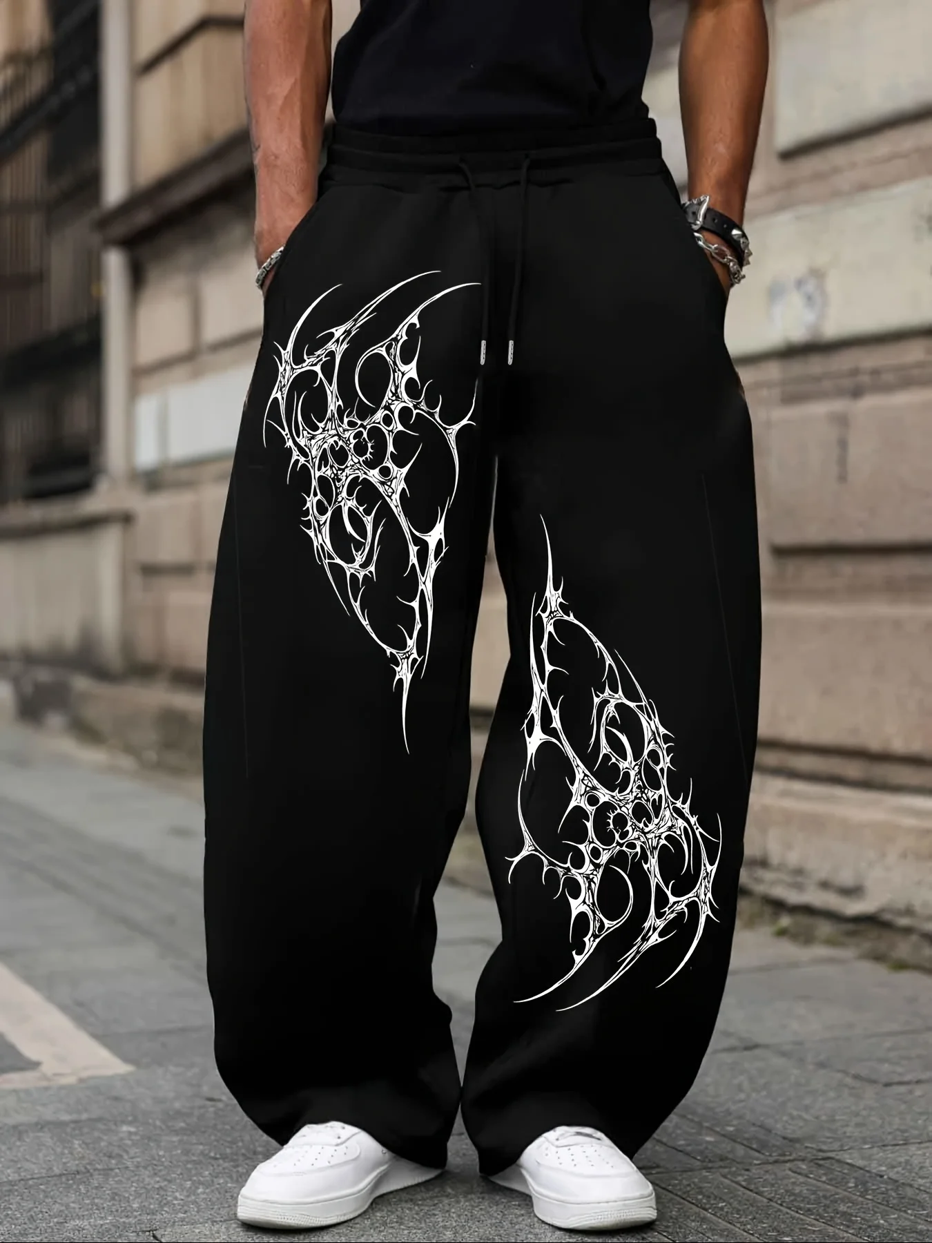 The Men's Sportswear Pants with Unique Gothic-style Pattern Prints and Elastic Waist Drawstring Are Perfect for The Street
The Men's Sportswear Pants with Unique Gothic-style Pattern Prints and Elastic Waist Drawstring Are Perfect for The Street