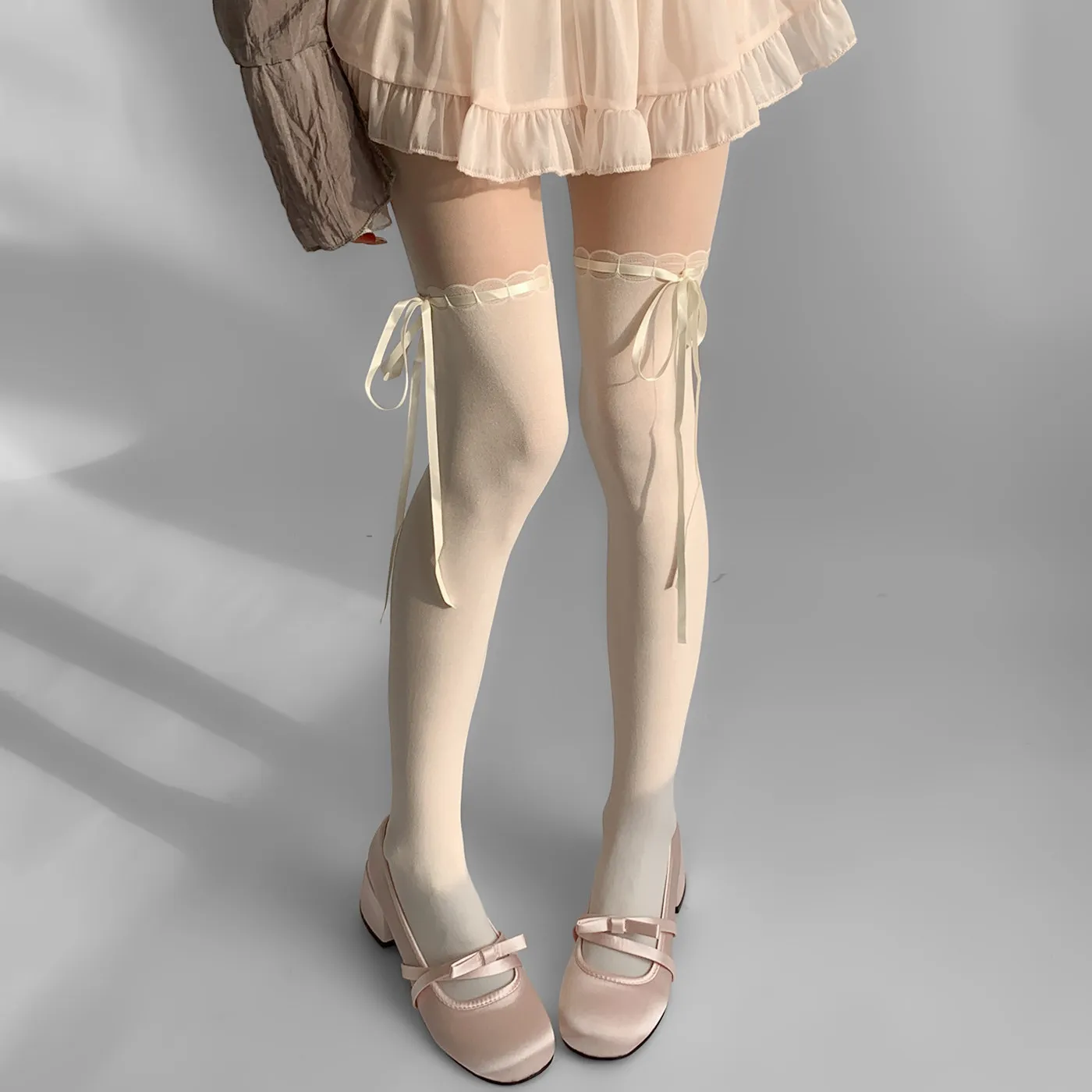 Женские колготки-чулки в японском стиле JK Lolita с бантом и лоскутным узором, высокие до бедра
Женские колготки-чулки в японском стиле JK Lolita с бантом и лоскутным узором, высокие до бедра