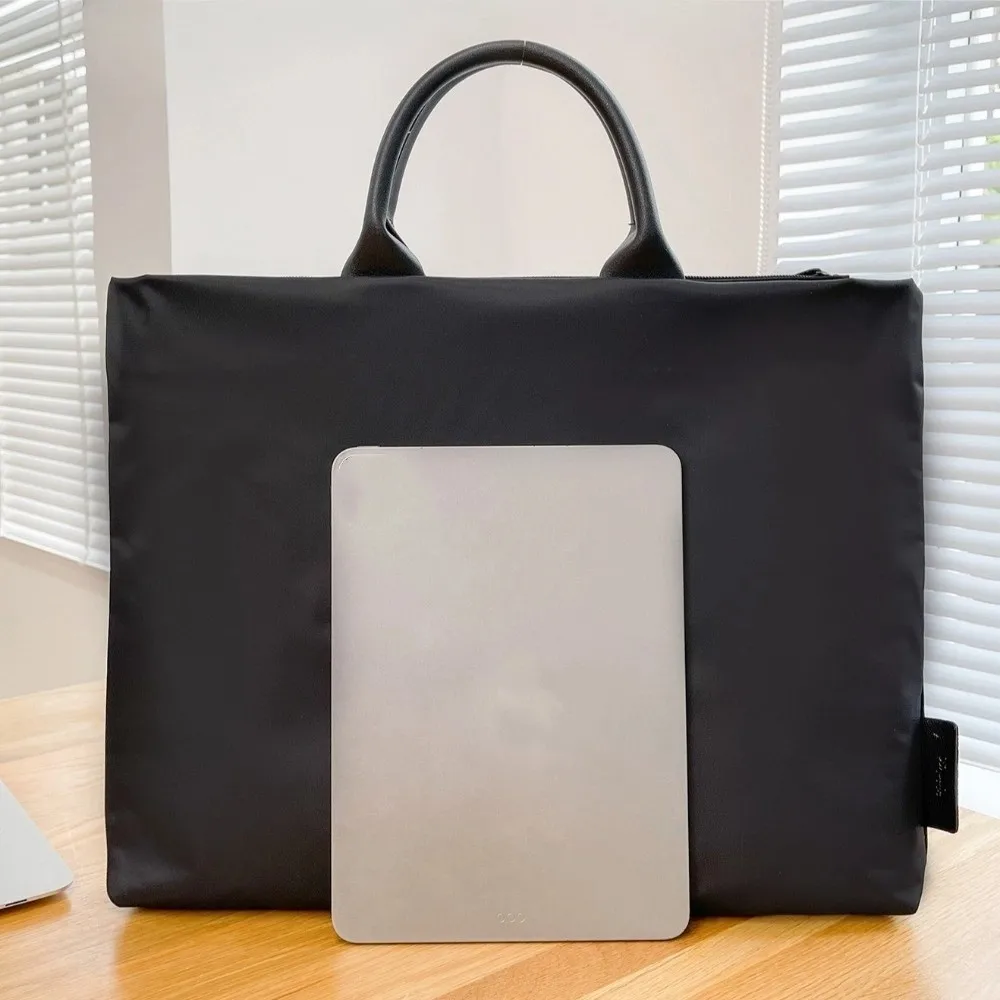 simple Waterproof Laptop Bag Nylon Fashionable Laptop Sleeve Bag Soft Document Bag Office Use
simple Waterproof Laptop Bag Nylon Fashionable Laptop Sleeve Bag Soft Document Bag Office Use