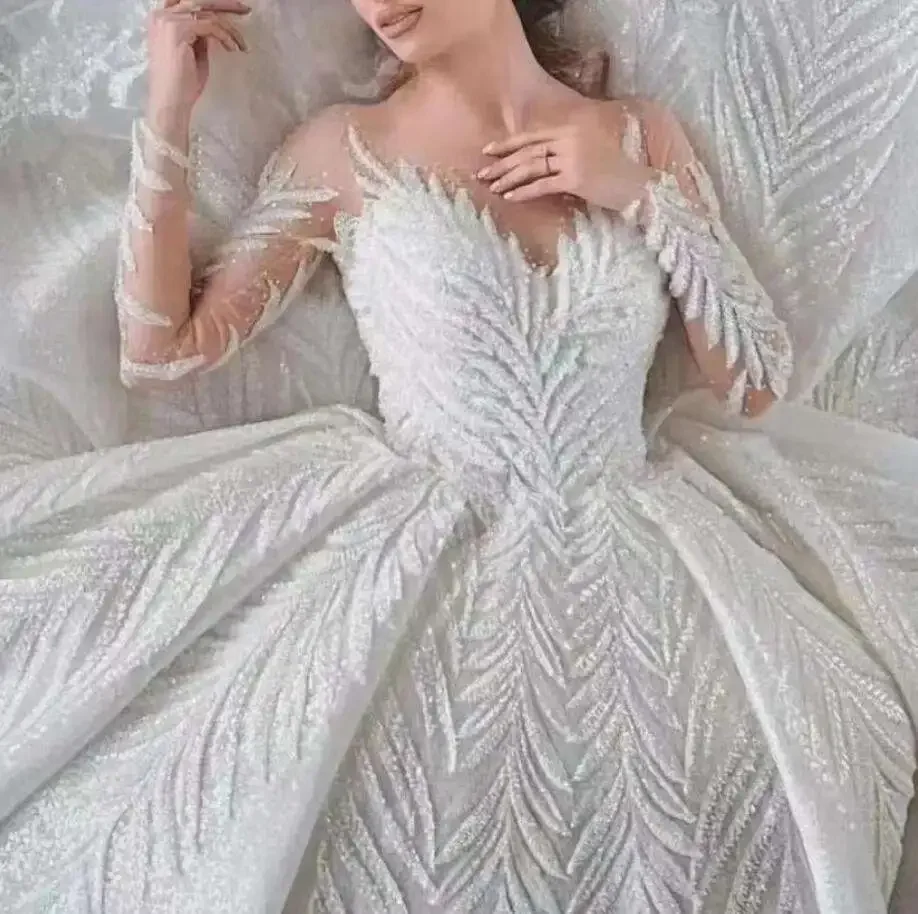 Customized Luxury Africa Leaf Shape Beaded Lace Appliques Full Bling Sequins Long Sleeve Princess Ball Gown Wedding Dress With T
Customized Luxury Africa Leaf Shape Beaded Lace Appliques Full Bling Sequins Long Sleeve Princess Ball Gown Wedding Dress With T