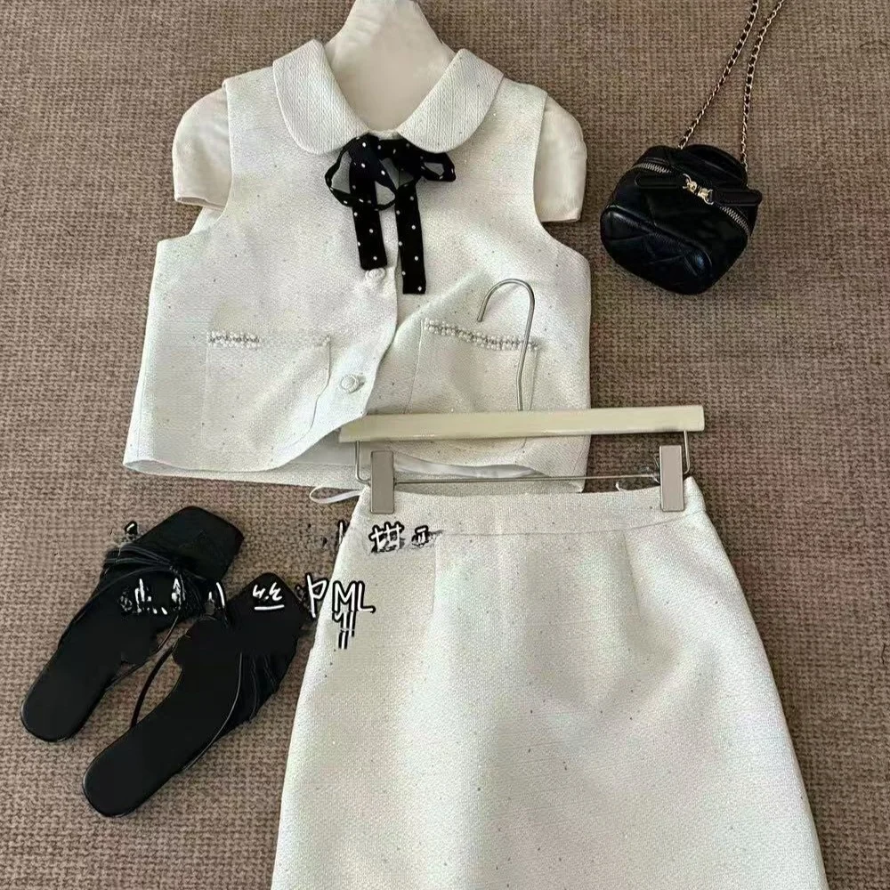 Ele 2025 Spring Summer New Sle Small Fraance Sle Vest Skirt Set with Silk Scarf Two Piece Set Women Faionable
Ele 2025 Spring Summer New Sle Small Fraance Sle Vest Skirt Set with Silk Scarf Two Piece Set Women Faionable