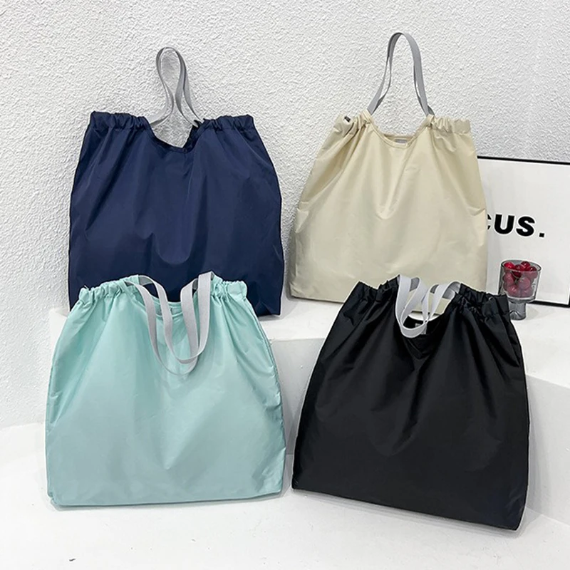 Large Reusable Shopping Bag Portable Oxford Fabric Waterproof Drawstring Foldable Simple Organizer Storage Shopper Handbag 
Large Reusable Shopping Bag Portable Oxford Fabric Waterproof Drawstring Foldable Simple Organizer Storage Shopper Handbag