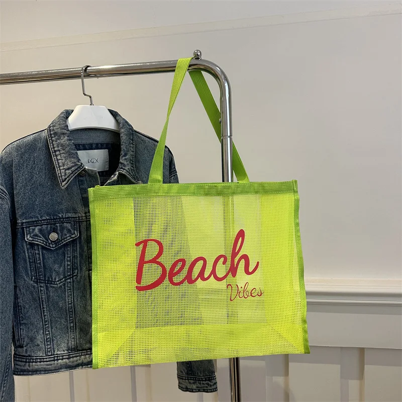 Women Casual Transparent Mesh Letter Shoulder Bag Female Fashion Portable Shopping Travel Large Capacity Beach Net Tote Handbag
Women Casual Transparent Mesh Letter Shoulder Bag Female Fashion Portable Shopping Travel Large Capacity Beach Net Tote Handbag