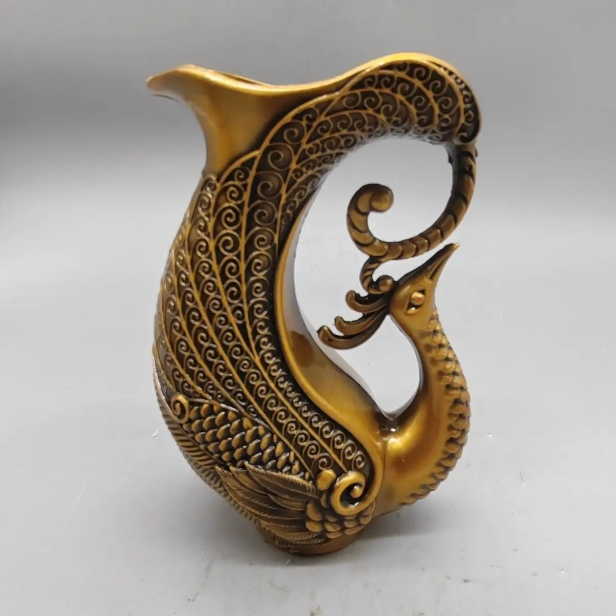 Китайская антикварная коллекция, латунная чашка для вина Феникс, древний кувшин, горшок для вина, книжный шкаф, настольные украшения, декоративные произведения искусства
Китайская антикварная коллекция, латунная чашка для вина Феникс, древний кувшин, горшок для вина, книжный шкаф, настольные украшения, декоративные произведения искусства