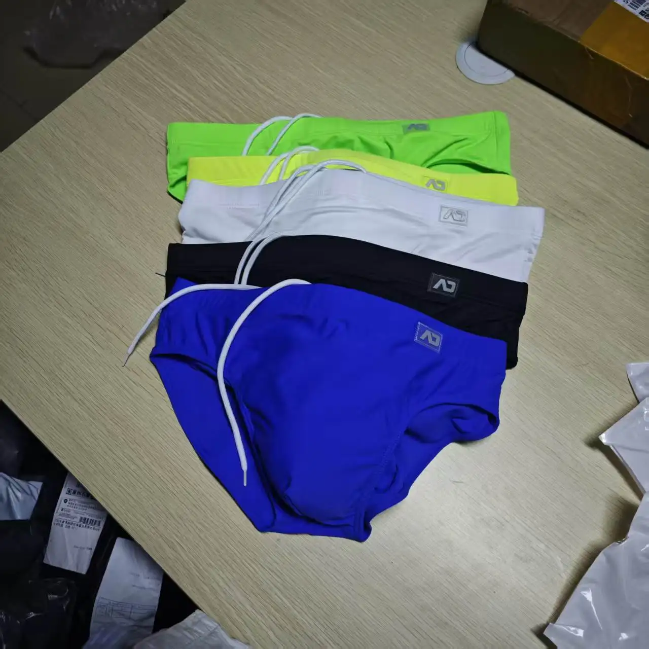 2026 fashion seaside beach surfing solid color simple classic men's low-rise swimming trunks wholesale multicolor BS420
2026 fashion seaside beach surfing solid color simple classic men's low-rise swimming trunks wholesale multicolor BS420