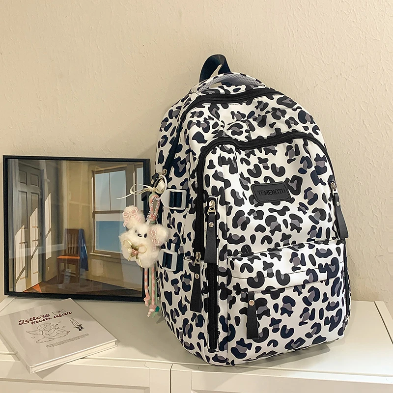 Leopard Print School Backpack Lightweight Travel Daypack Nylon Middle School Bag for High School Students
Leopard Print School Backpack Lightweight Travel Daypack Nylon Middle School Bag for High School Students