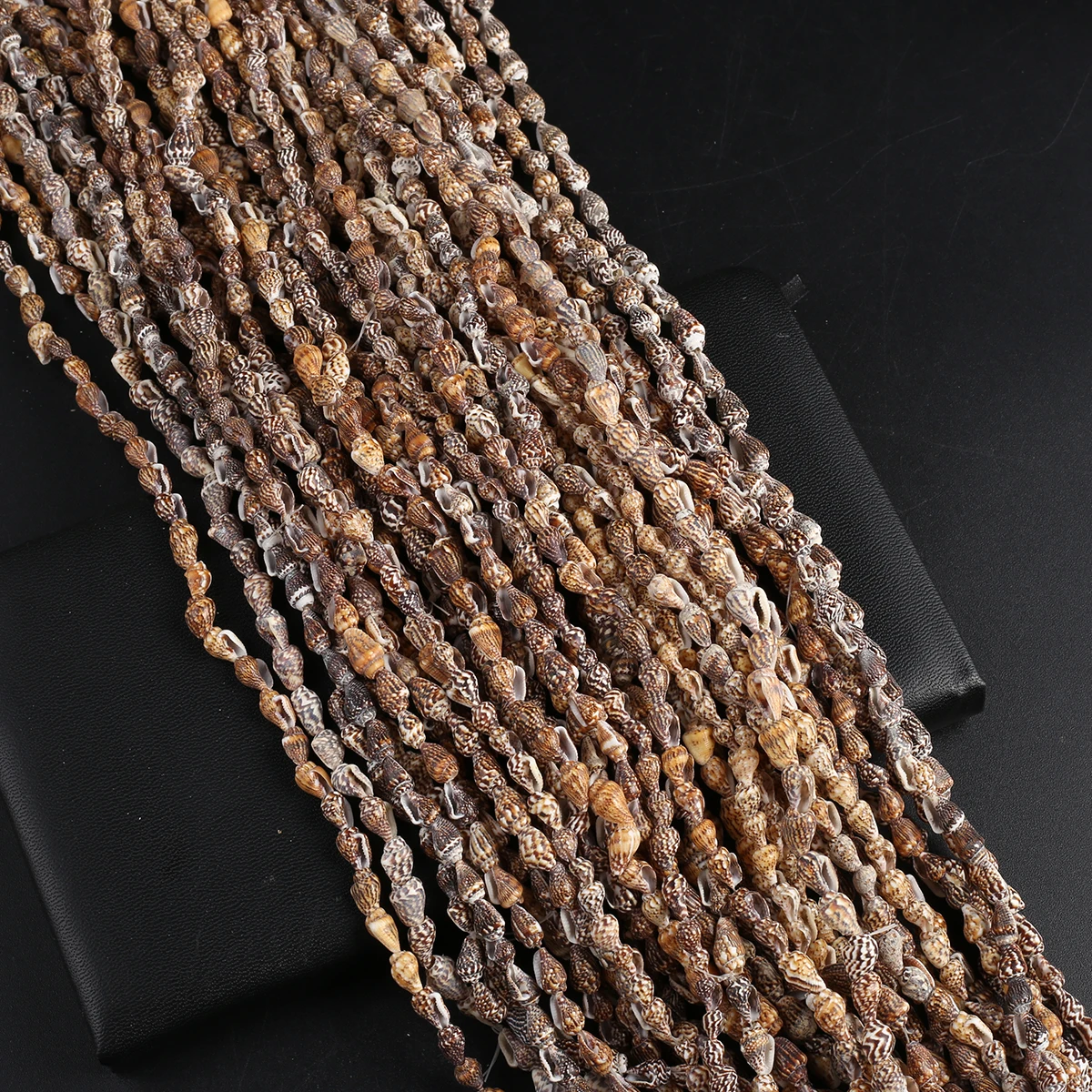 Charming Brown Natural Conch Shell Beads Beach Jewelry Decoration DIY Necklace Bracelet Accessories Gift Length 150cm
Charming Brown Natural Conch Shell Beads Beach Jewelry Decoration DIY Necklace Bracelet Accessories Gift Length 150cm