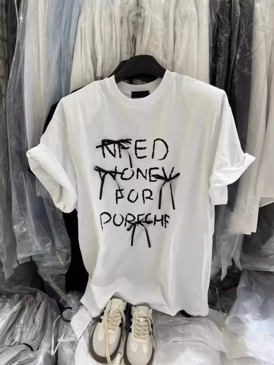 Loose oulder Pad T-irt Women's Summer Casual Sle round Ne ort Sve Letter Print Knot Large Size Top
Loose oulder Pad T-irt Women's Summer Casual Sle round Ne ort Sve Letter Print Knot Large Size Top