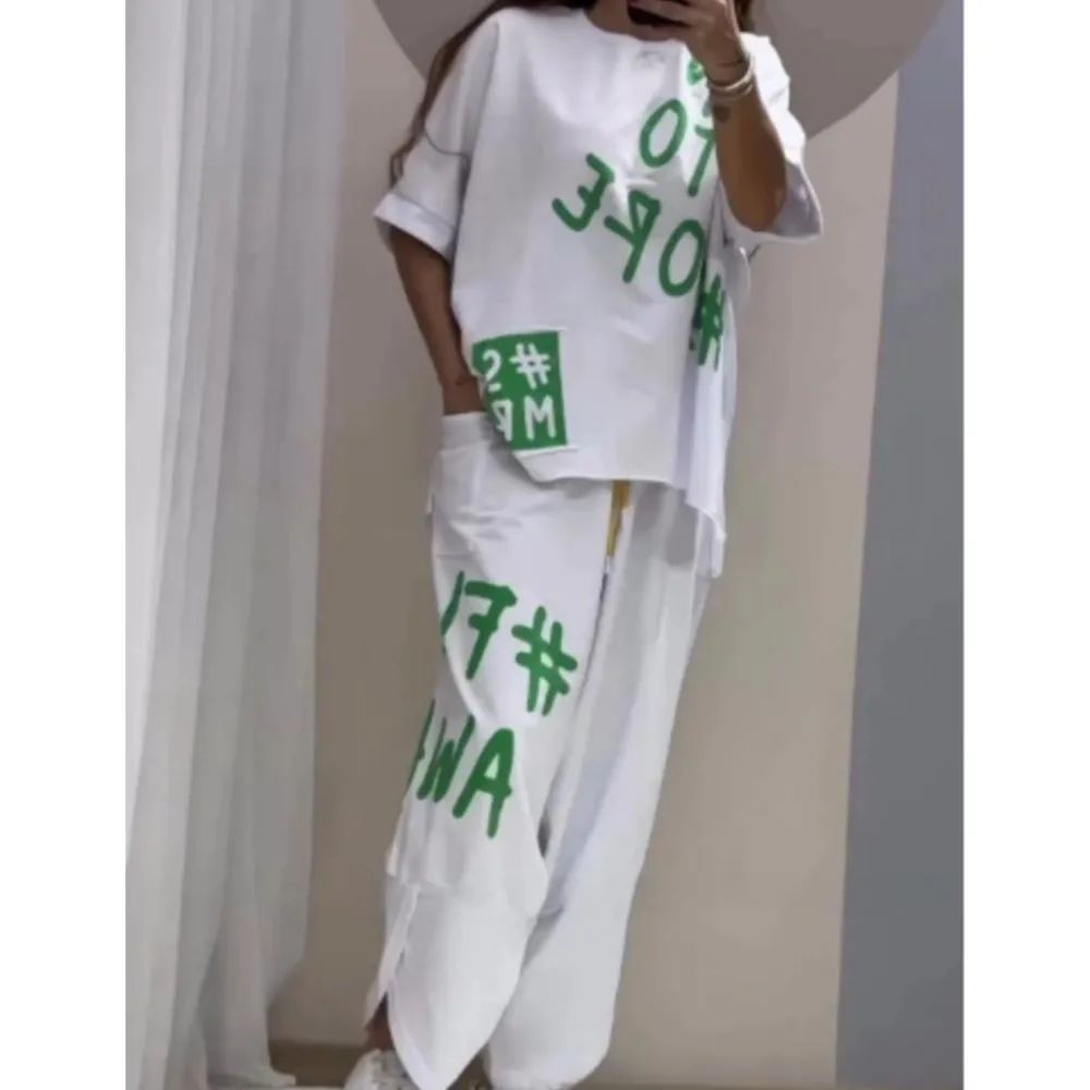 Модный повседневный спортивный костюм, топ со средним рукавом и круглым вырезом + маленькие брюки-харли, комплекты из 2 предметов для женщин, весенний комплект с буквенным принтом, женский 
Модный повседневный спортивный костюм, топ со средним рукавом и круглым вырезом + маленькие брюки-харли, комплекты из 2 предметов для женщин, весенний комплект с буквенным принтом, женский