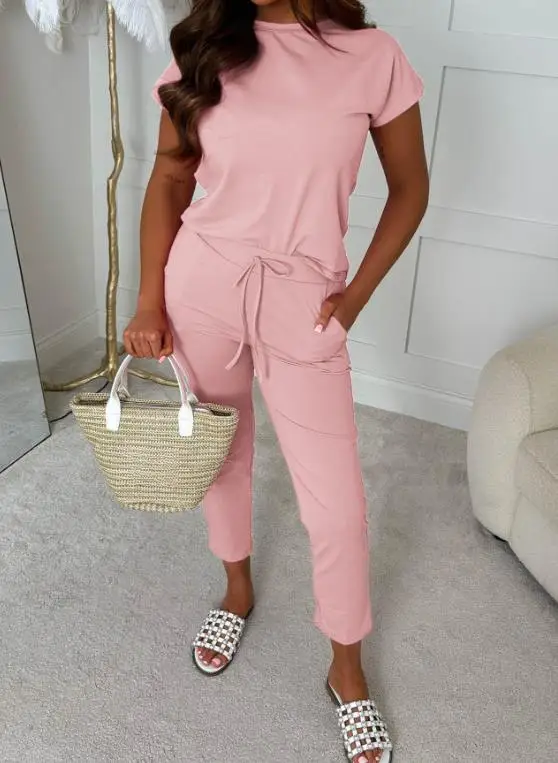 Summer Women's Solid Color Sports Style 2-Piece Slim Fit Round Neck Short Sleeved T-Shirt and Lace Up Slim Fit Ankle Pants Set
Summer Women's Solid Color Sports Style 2-Piece Slim Fit Round Neck Short Sleeved T-Shirt and Lace Up Slim Fit Ankle Pants Set