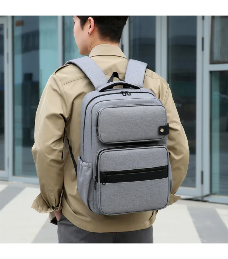 Light gray double compartment backpack with black strip decor anti splash round snap detail for daily work storage
Light gray double compartment backpack with black strip decor anti splash round snap detail for daily work storage