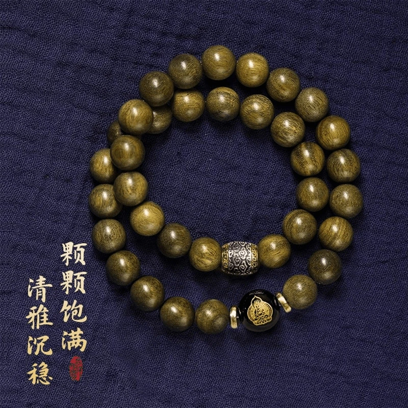 Golden double-ring 12 zodiac sign bracelet made of dark , small-leaf nanmu, old black , vintage style, soft wood,
Golden double-ring 12 zodiac sign bracelet made of dark , small-leaf nanmu, old black , vintage style, soft wood,