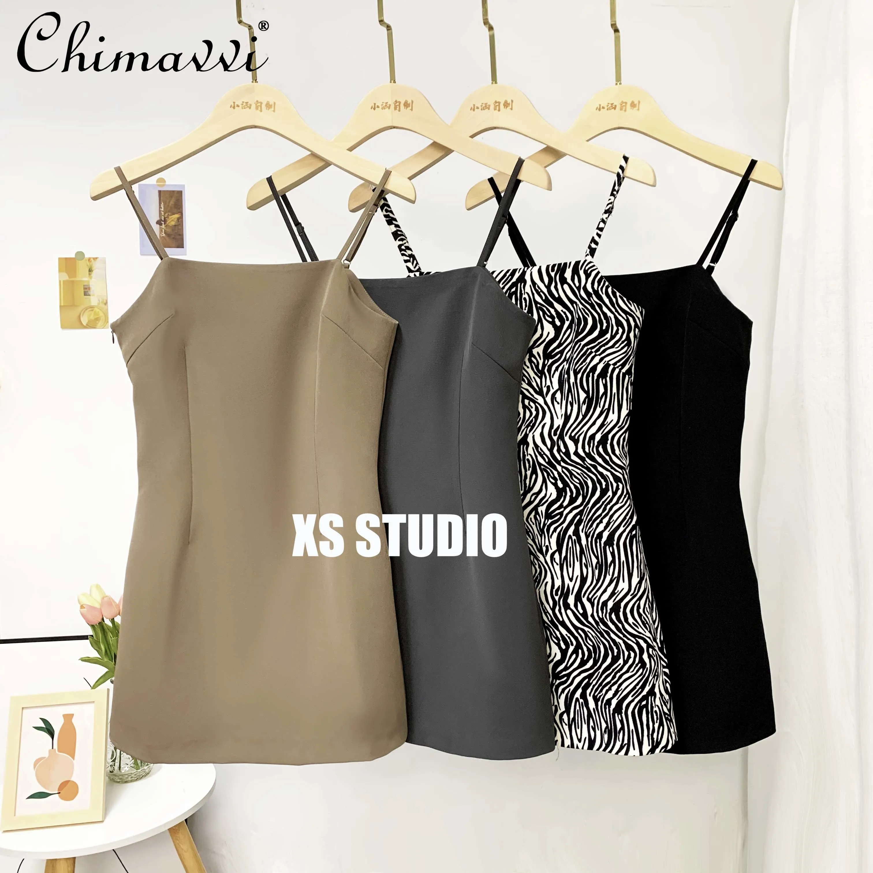 Sexy Sling French Ladies Dresses 2022 New Spring and Summer New Fashion Slim Short Temperamental Short Black Dress for Women
Sexy Sling French Ladies Dresses 2022 New Spring and Summer New Fashion Slim Short Temperamental Short Black Dress for Women
