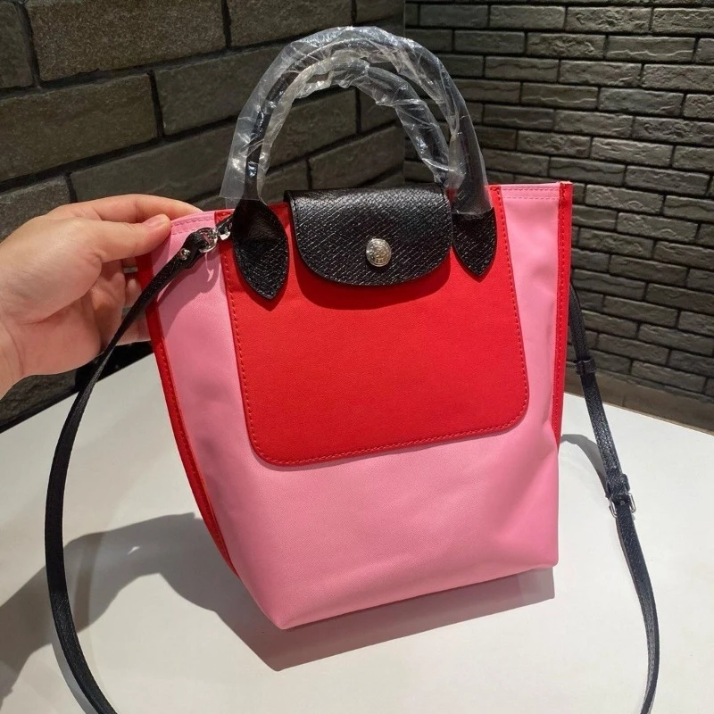 New Nylon Shoulder Bag Tote Bag Color blocked Thick Handbag Mini Crossbody Bag
New Nylon Shoulder Bag Tote Bag Color blocked Thick Handbag Mini Crossbody Bag