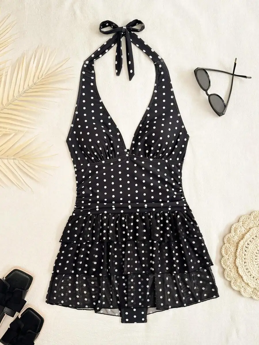 Black White Polka Dot Halterneck Sleeveless Swim Dress With Tiered Ruffle Skirt And Adjustable Neck Tie
Black White Polka Dot Halterneck Sleeveless Swim Dress With Tiered Ruffle Skirt And Adjustable Neck Tie