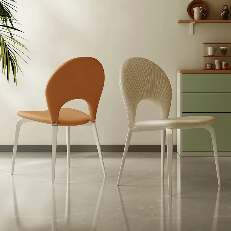 French cream style dining chair Internet celebrity designer Nordic modern simple home white leather dining table back chair
French cream style dining chair Internet celebrity designer Nordic modern simple home white leather dining table back chair