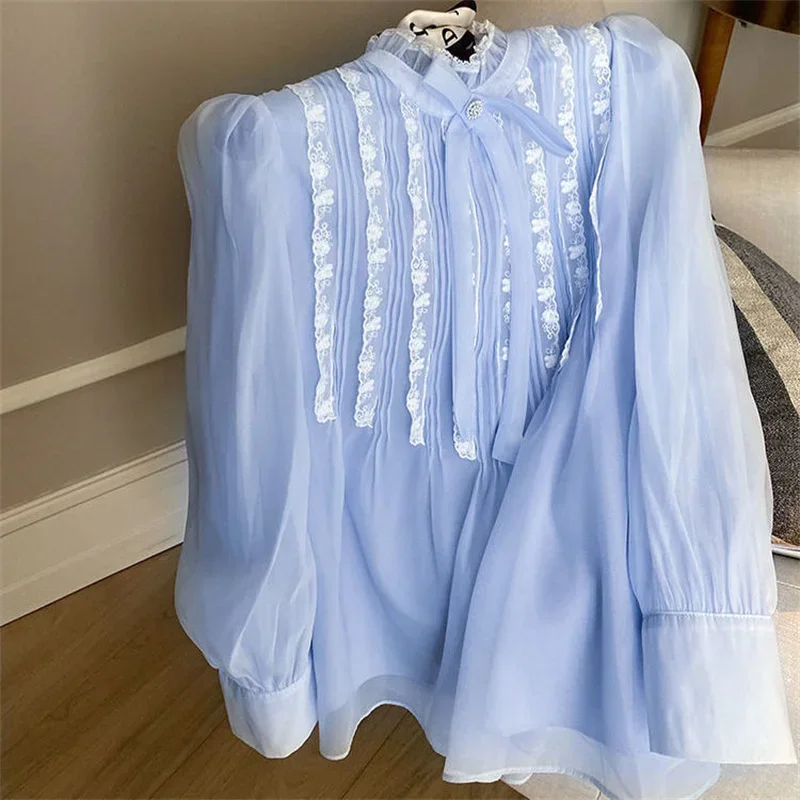 Vintage Spring Baroque Women Shirt Lolita Sweet Lace Patchwork Tops Korean Elegant Ruffles Bow Long Puff Sleeve Blouse Mujer
Vintage Spring Baroque Women Shirt Lolita Sweet Lace Patchwork Tops Korean Elegant Ruffles Bow Long Puff Sleeve Blouse Mujer