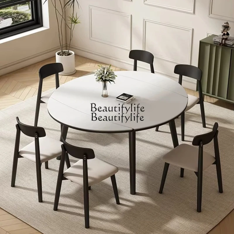 Solid wood modern simple telescopic variable round table square and round dual-purpose bright rock slab dining table
Solid wood modern simple telescopic variable round table square and round dual-purpose bright rock slab dining table