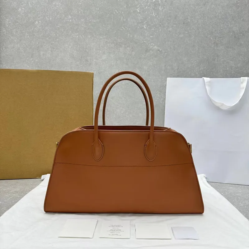 2024 Women's Genuine Leather Material Silver Hardware Accessories Large Capacity Top Quality Handbag
2024 Women's Genuine Leather Material Silver Hardware Accessories Large Capacity Top Quality Handbag