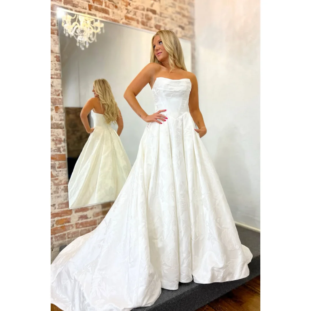 Luxurious Floral Satin Strapless A-line Wedding Dresses With Pockest Boat-neck Basque Waist Floor-Length Brides Gowns Customized
Luxurious Floral Satin Strapless A-line Wedding Dresses With Pockest Boat-neck Basque Waist Floor-Length Brides Gowns Customized