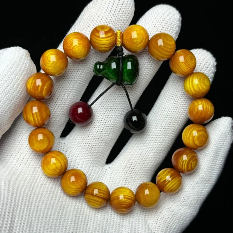 Northeast , buttery jade-like material, northern agarwood, fully translucent pine seeds, amber wood beads, collectible
Northeast , buttery jade-like material, northern agarwood, fully translucent pine seeds, amber wood beads, collectible
