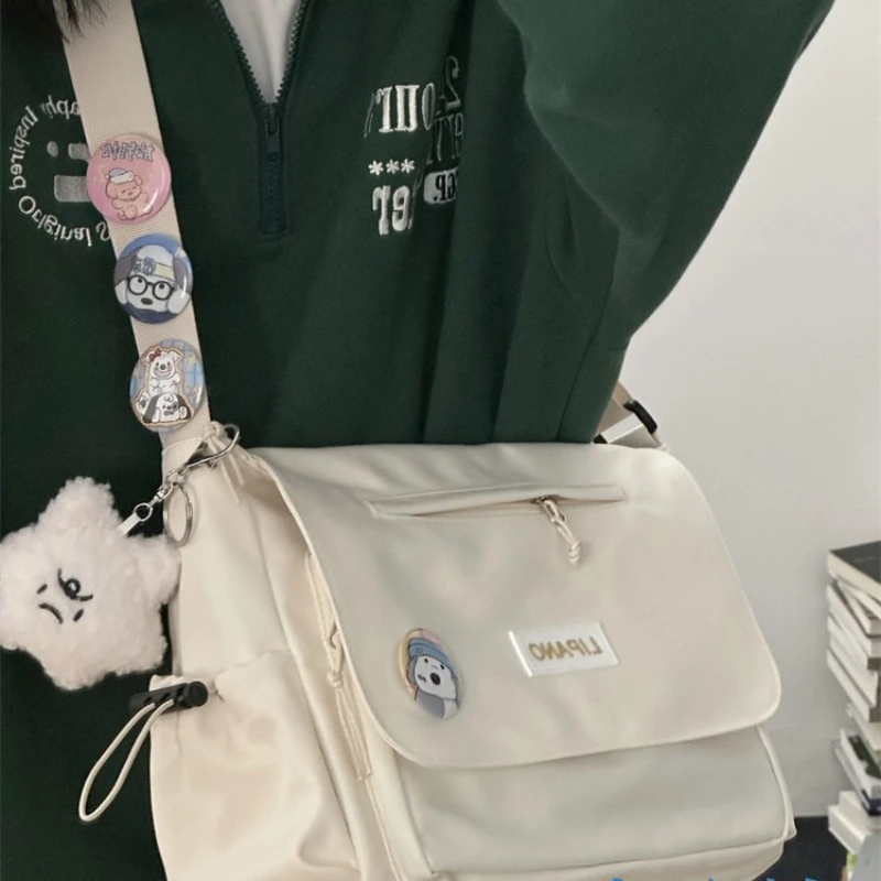 Сумка через плечо, сумка большой вместимости, женский японский мужской рюкзак через плечо, модный корейский студенческий наряд Harajuku
Сумка через плечо, сумка большой вместимости, женский японский мужской рюкзак через плечо, модный корейский студенческий наряд Harajuku